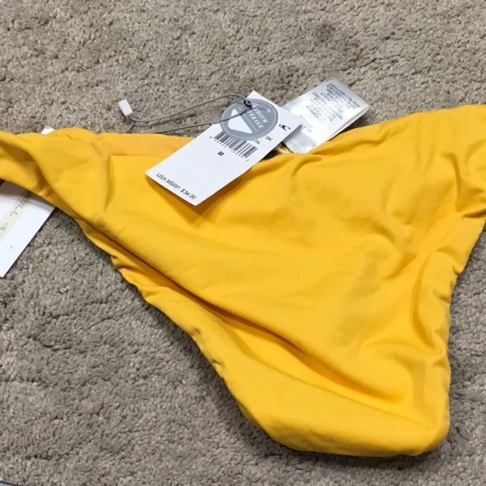 O’Neill golden yellow strappy bikini set. NWT